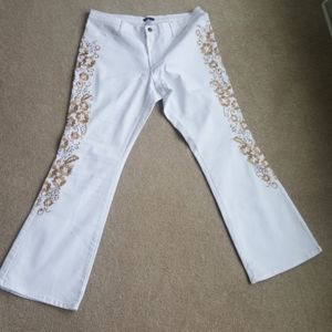 white jeans embellished with gold